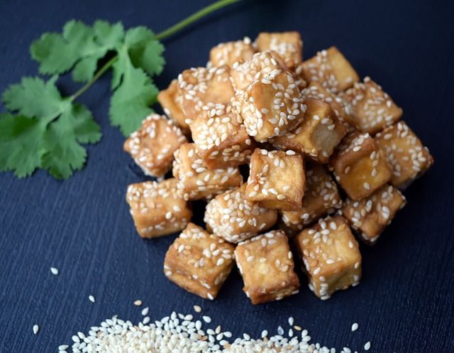 Tofu is easy to use, vegan, and high in protein.