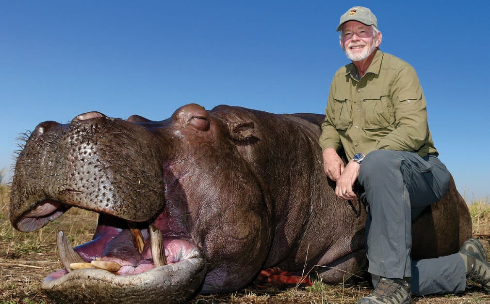 Hunter and murdered rhino