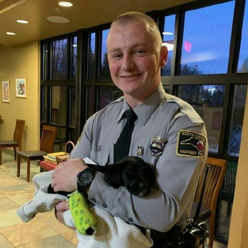 state trooper and his puppy