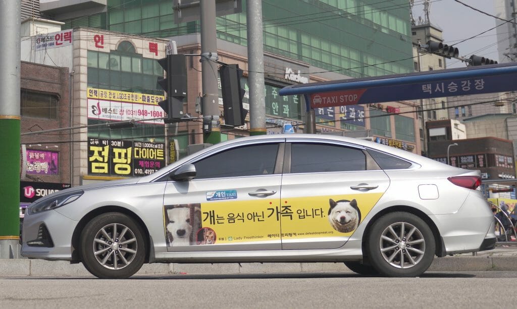 dog meat awareness ad on taxi